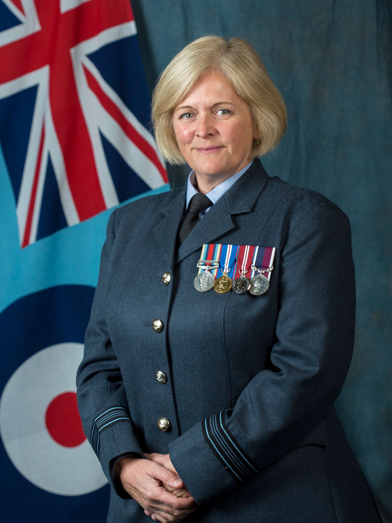 Acting Wing Commander Cartwright official portrait picture prior to promotion show her in Squadron Leader rank insignia