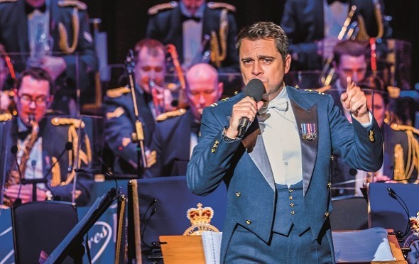 Squadron Leader Matthew Little sings with the RAF Band.