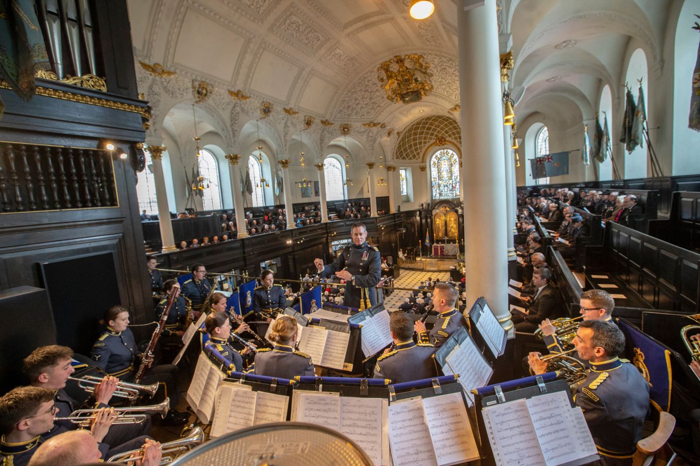 RAF band play music in church.