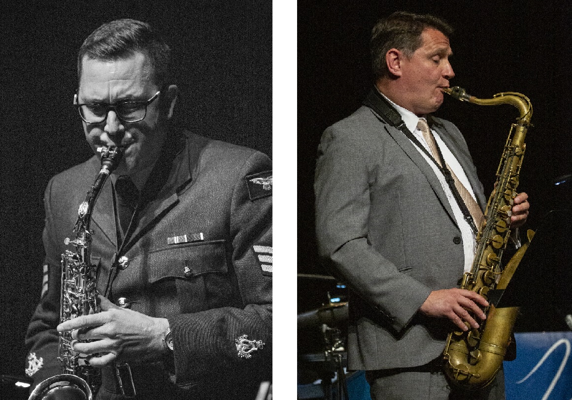 Two men playing saxophone.