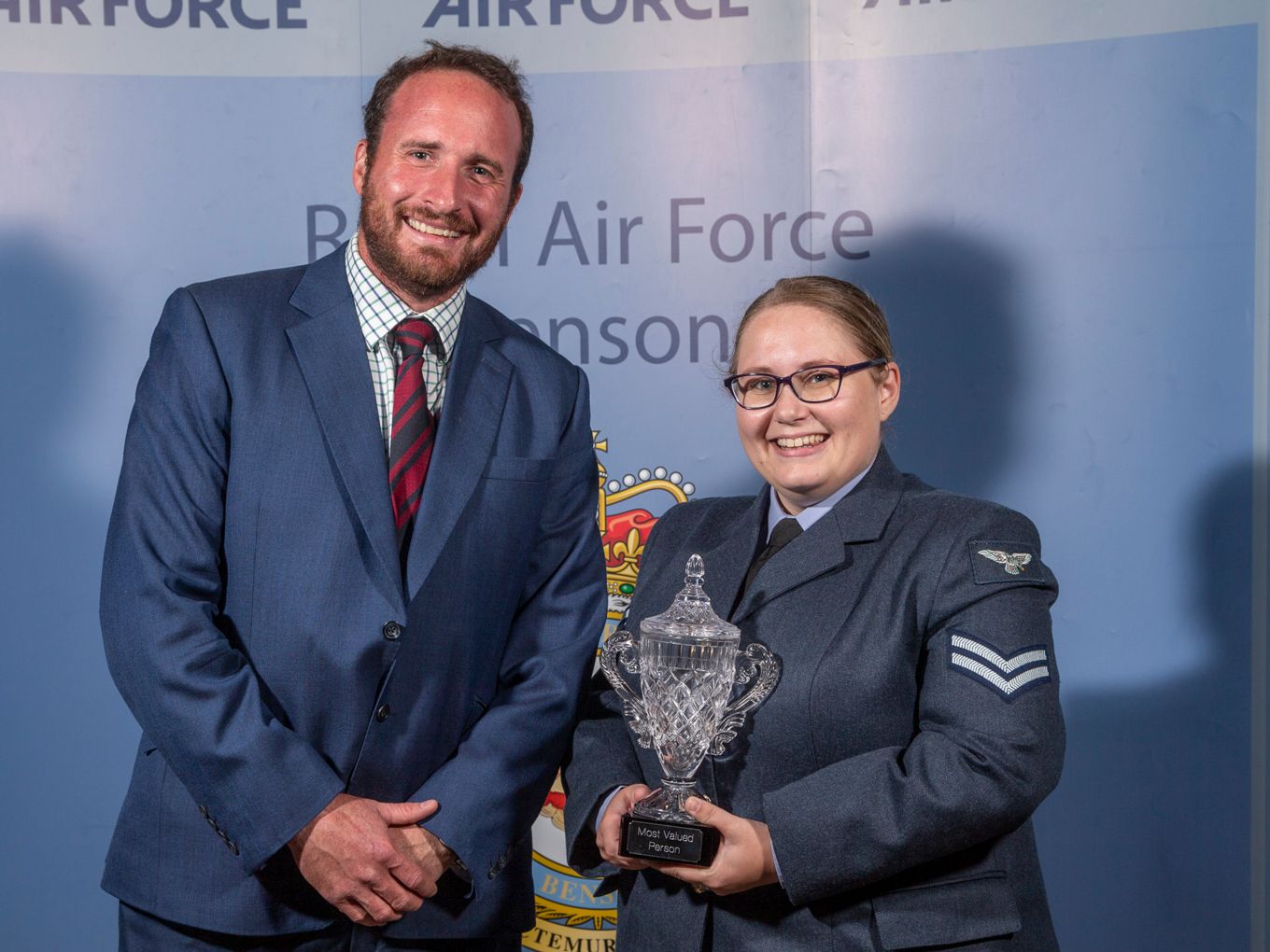 Cpl Kay is presented with her award