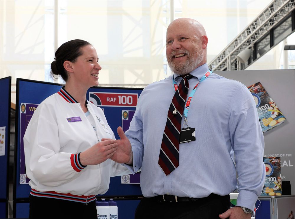A Physical Training Instructor gives expert advice to a Nationwide Employee
