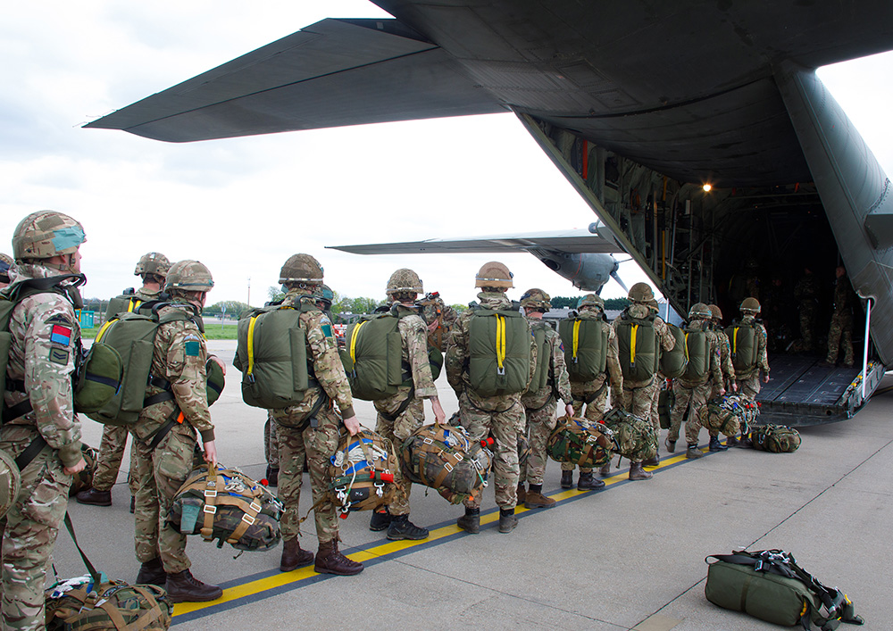 Troops boarding C-130 Hercules ahead of parachute drops