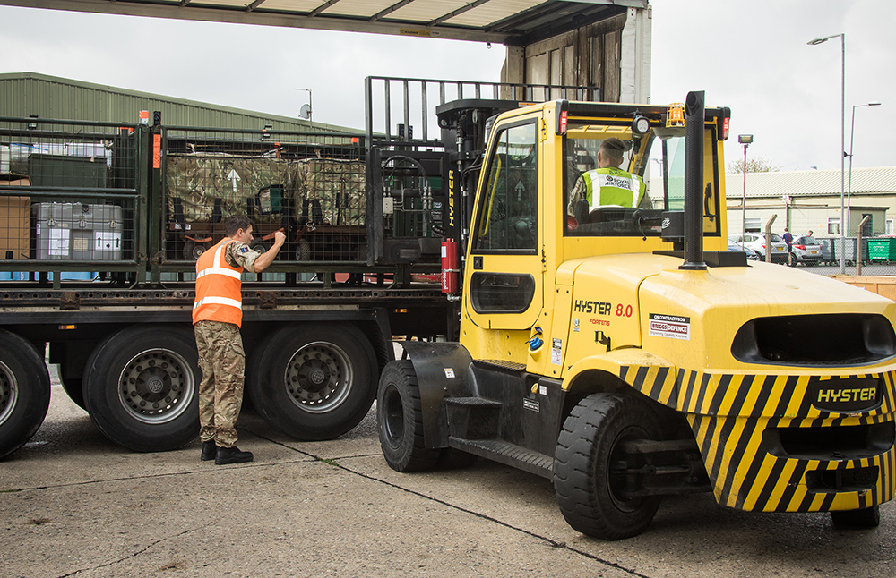 Logistics Movers unload and prepare the freight ready for Exercise Saif Sareea 3