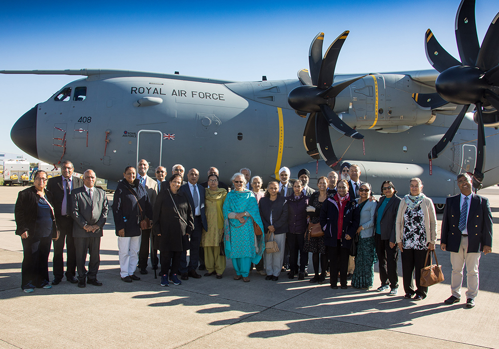 Visitors from the Swindon Punjabi Centre Elderly Group, Swindon Hindu Centre and Gita Study group pictured outside an A400M Atlas