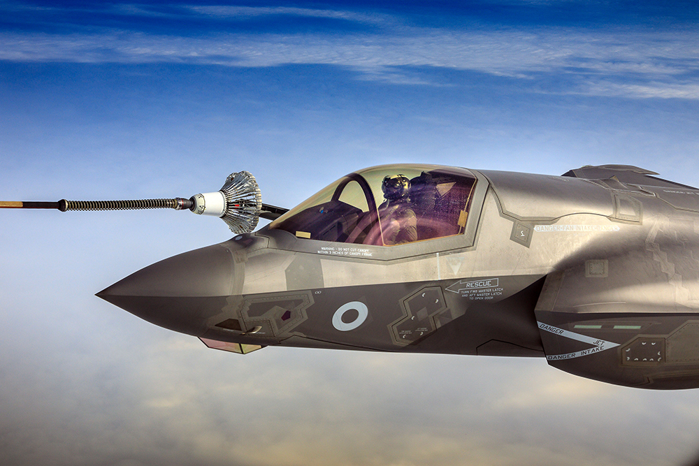 An F-35B Lightning II jet receives fuel from the Voyager for the first time in the UK