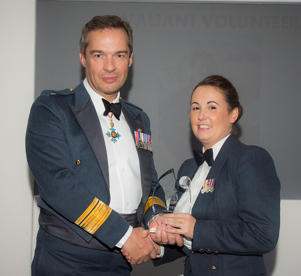Valiant Volunteer Award winner, Sergeant Becky Quinn is presented with the award by Air Officer Commanding No. 2 Group, Air Vice-Marshal David Cooper CBE MA BEng (Hons)