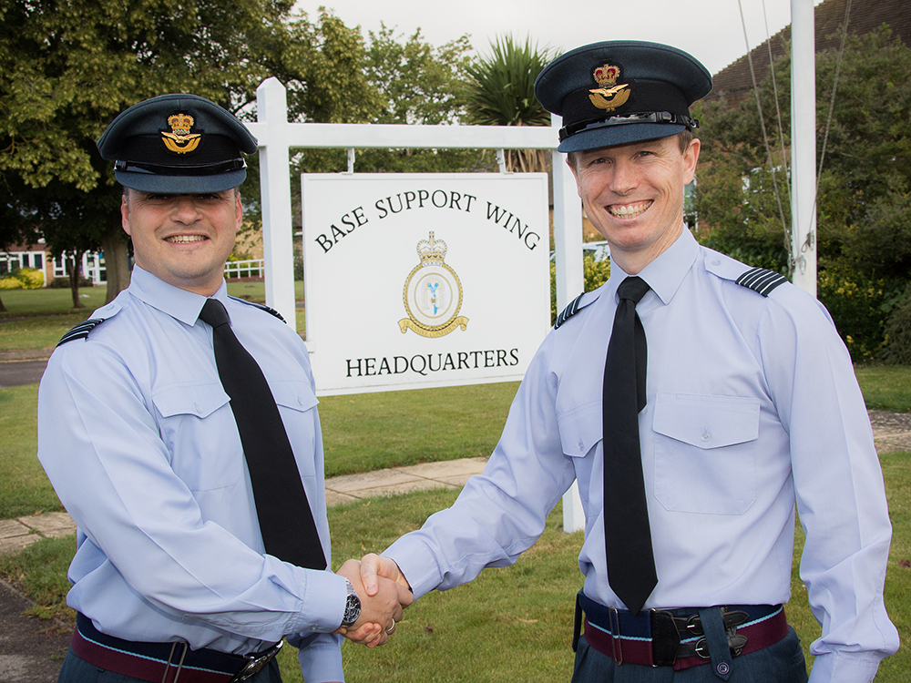 Wing Commander Bunce officially hands over the reins of Base Support Wing to Wing Commander John Hetherington