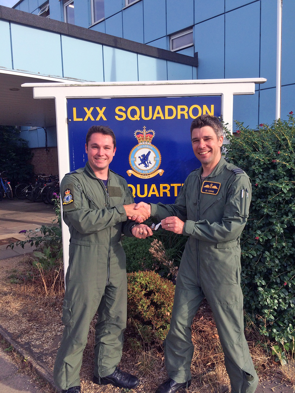 Wing Commander Ed Horne, Officer Commanding LXX Squadron, presenting Sergeant Greg Stevens with his Loadmaster brevet