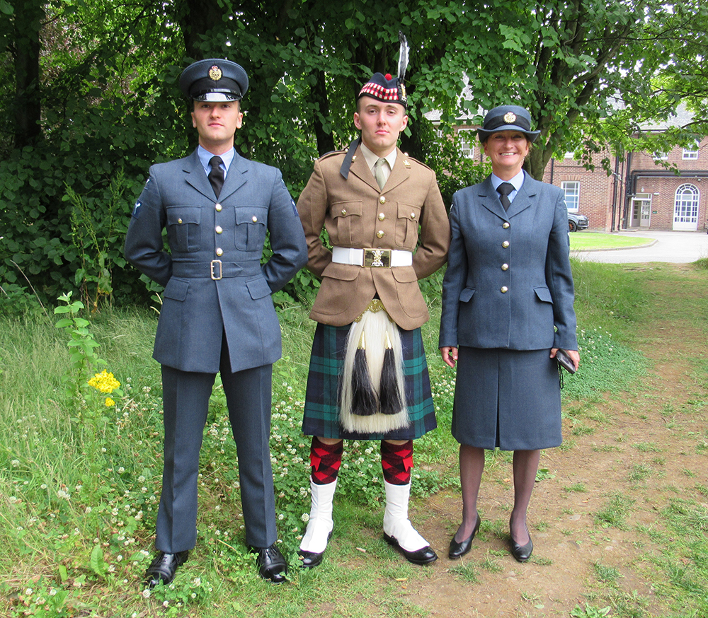 Senior Aircraftwoman Tulloch with her twin sons, Senior Aircraftman Britten and Private Britten