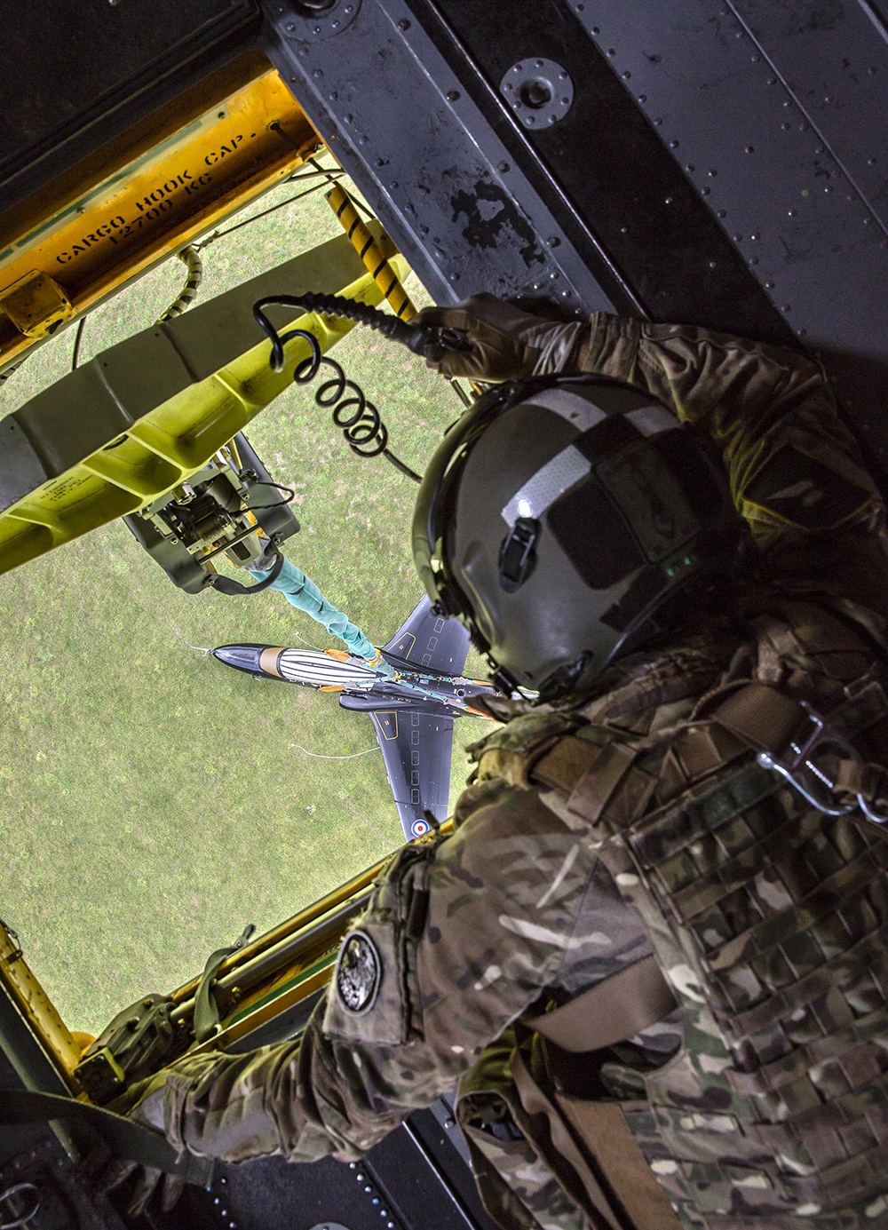 Looking down on the underslung T1 Hawk from the belly of the Chinook