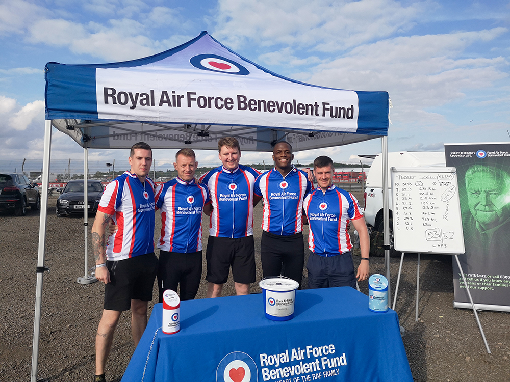 Pictured, five members of the Tactical Medical Wing Logistics Supply at Silverstone raising awareness of RAF Benevolent Fund