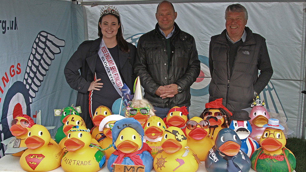 VIPs judging the corporate duck entries... RAF Brize Norton Station Commander, Dan James (centre), Deputy Mayor of Lechlade on Thames, Cllr Steve Trotter, and Miss Gloucester, Tamsin Grainger.