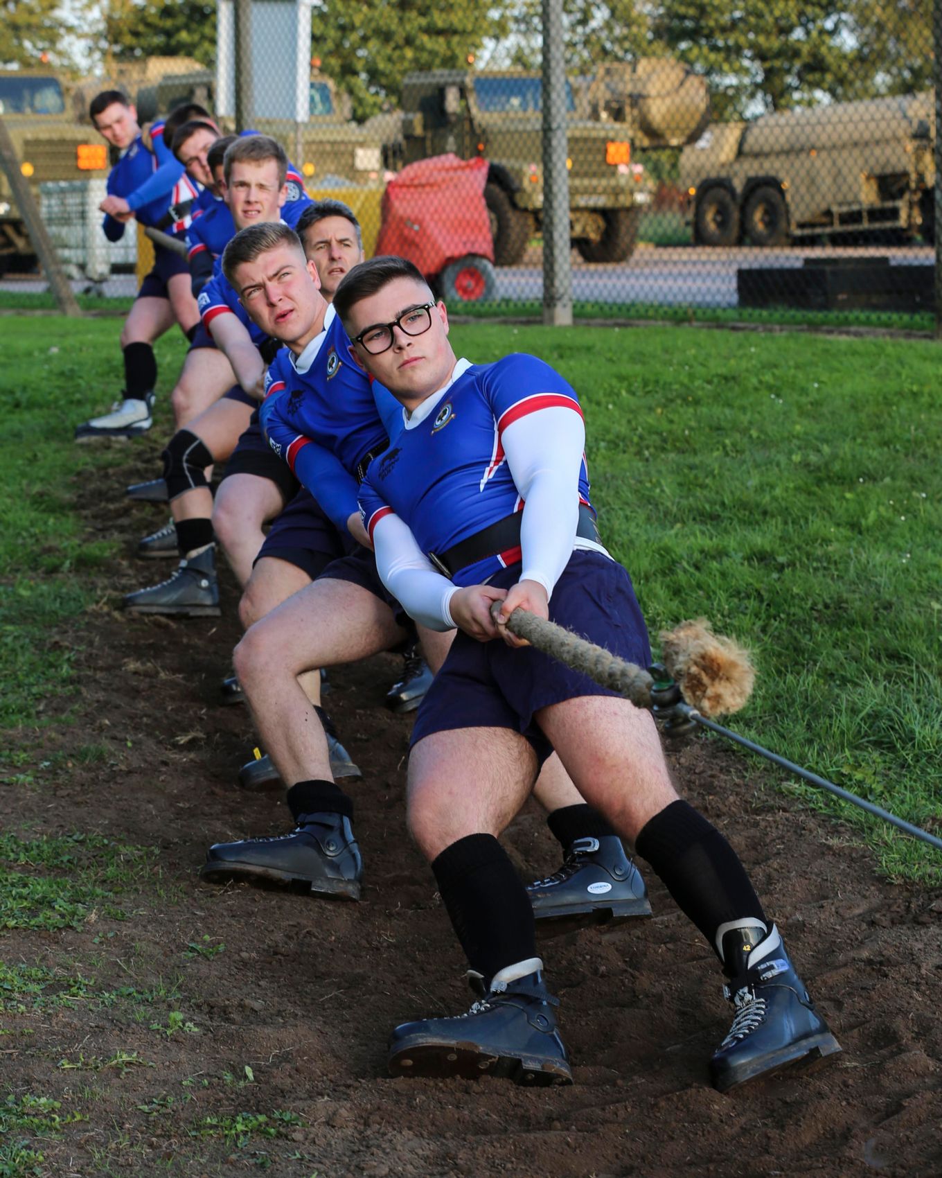 Tug of war team pulling on rope