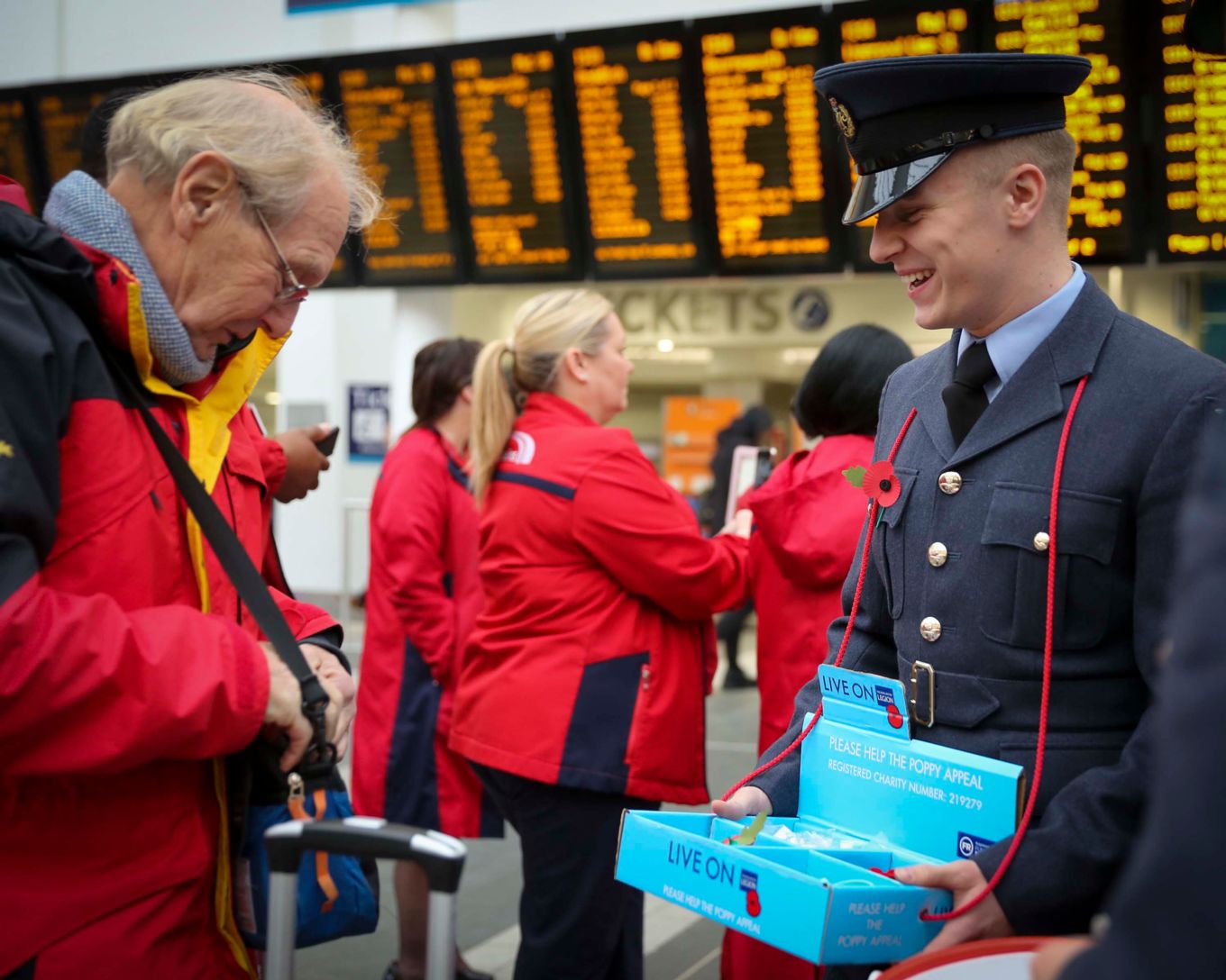 Man donating money for a poppy