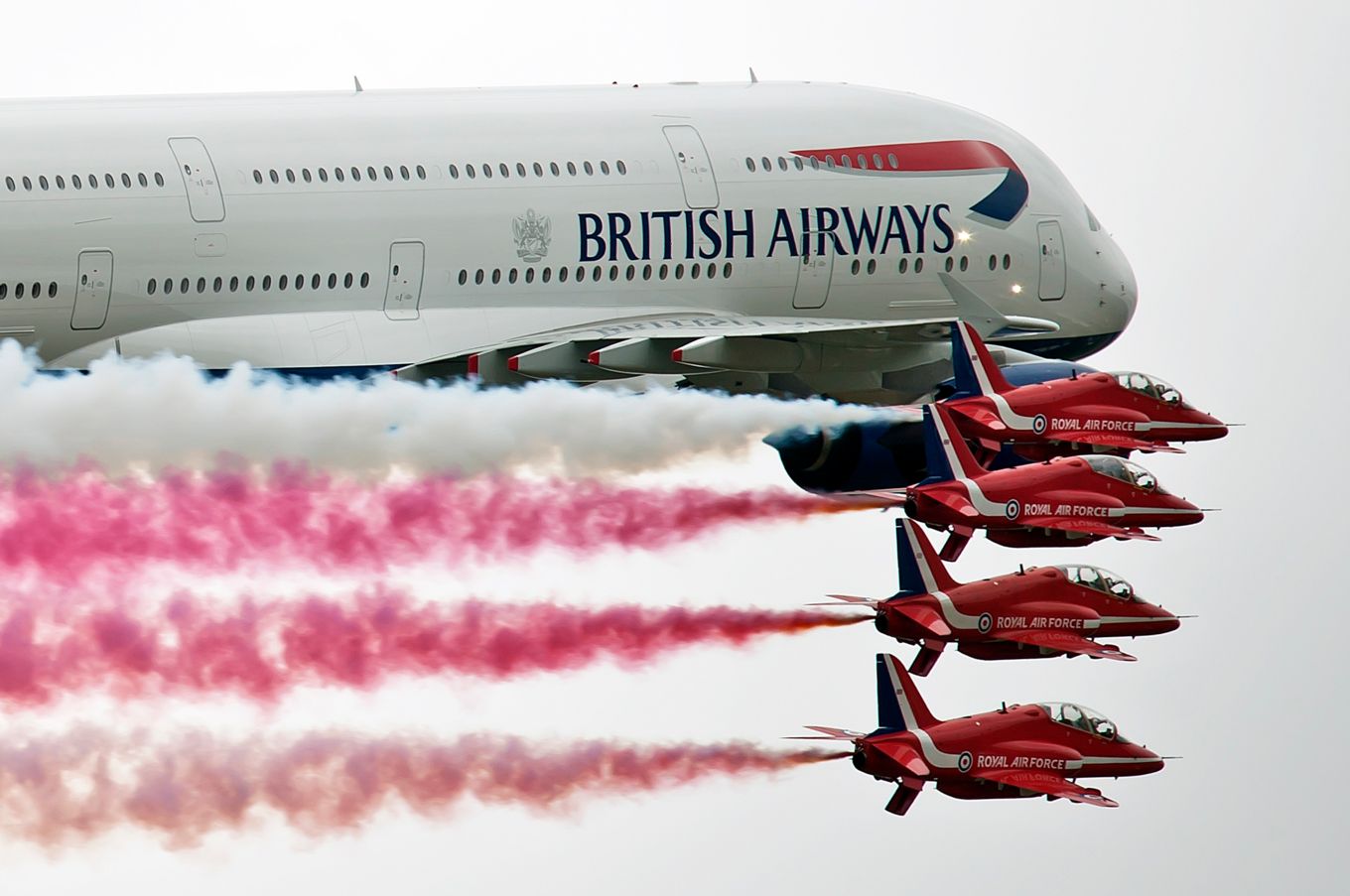 The Red Arrows with a British Airways Airbus A380 at RIAT in 2013. Pic by Rich Cooper.