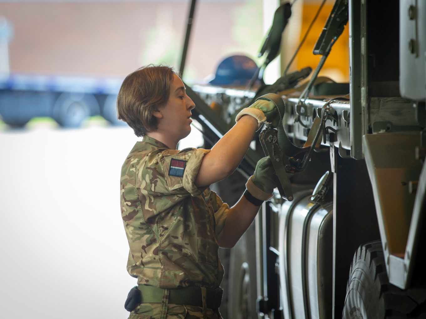 Personnel from No 2 Mechanical Transport Squadron working on vehicles similar to those deployed to Exercise Said Sareea.