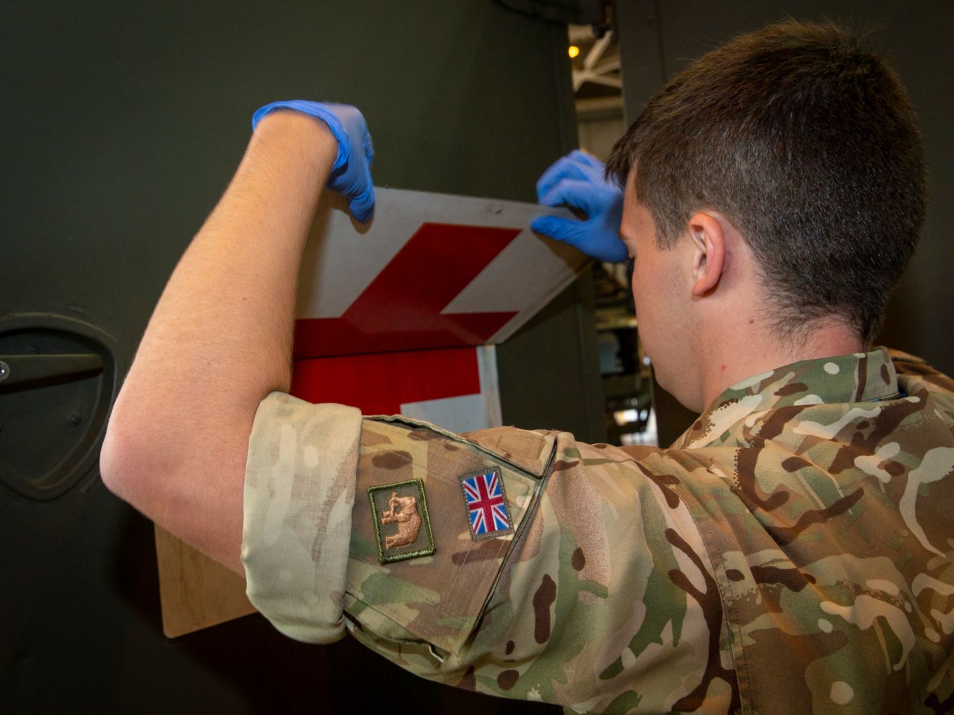 Personnel from No 2 Mechanical Transport Squadron working on vehicles similar to those deployed to Exercise Said Sareea.