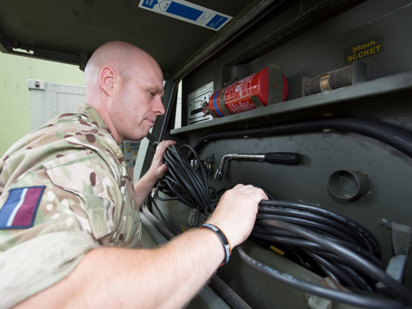 Cpl Martin Bulmer working on equipment at RAF Wittering in preparation for Exercise Saif Sareea 3