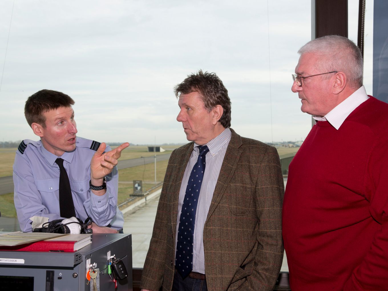 From left to right: Squadron Leader Tom Hammond, Simon Robertson and Iain Cooper in conversation at Air Traffic Control
