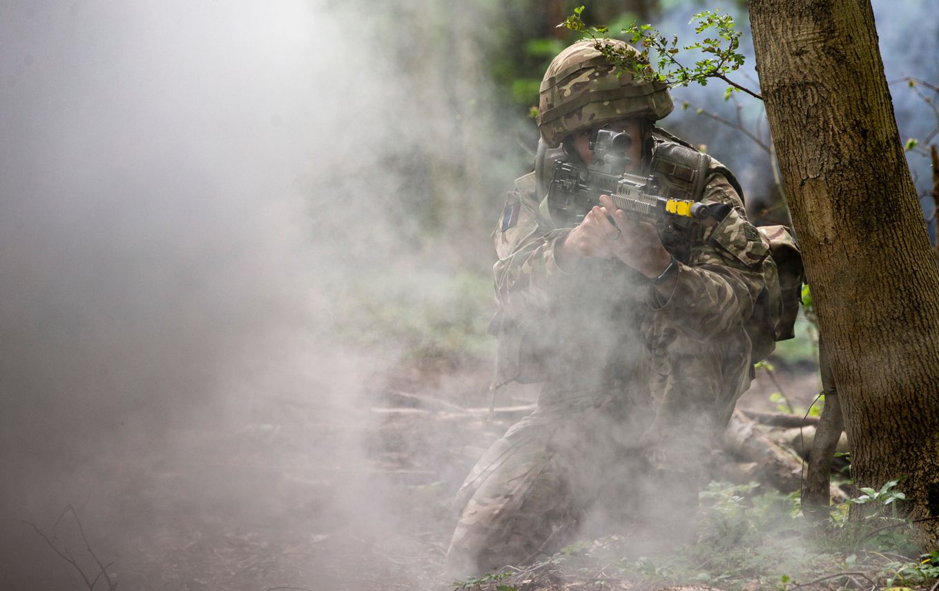 1AMW personnel practice their military skills during Exercise Swift Pirate