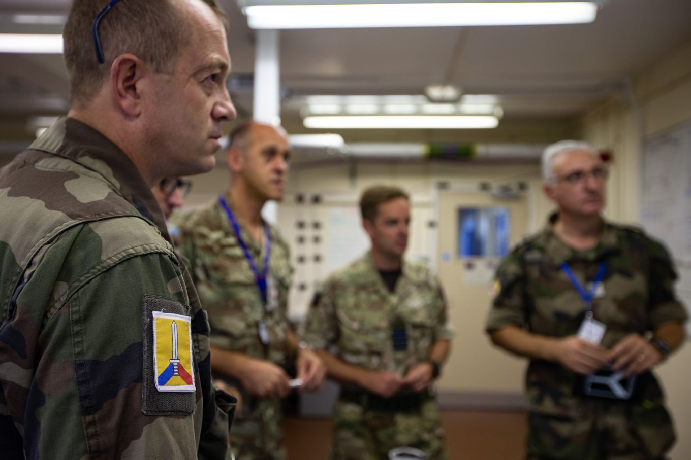 One of the French officers working in a syndicate group – the arm patch he wears is the insignia of the PCFL.