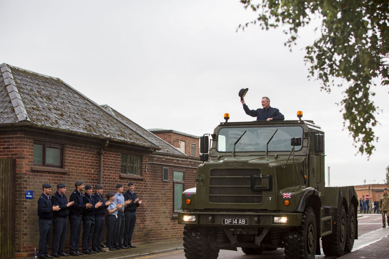 As is traditional at RAF Wittering, retiring Warrant Officers are driven from the Station in an Oshkosh truck.