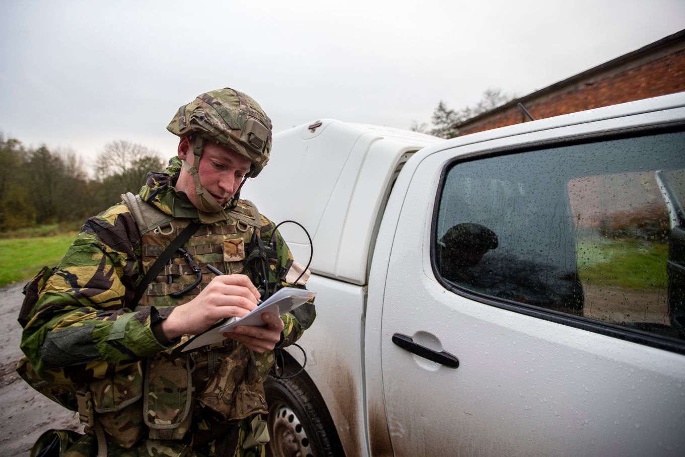 A driver from 2MT making notes during one of the exercise injects