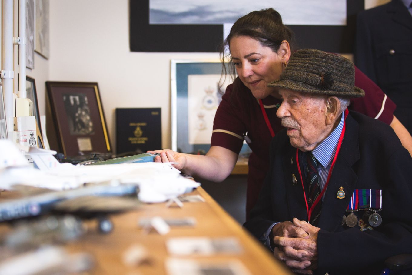 Lisa Herbert and Mr Salvage look over the models in the RAF Wittering history rooms