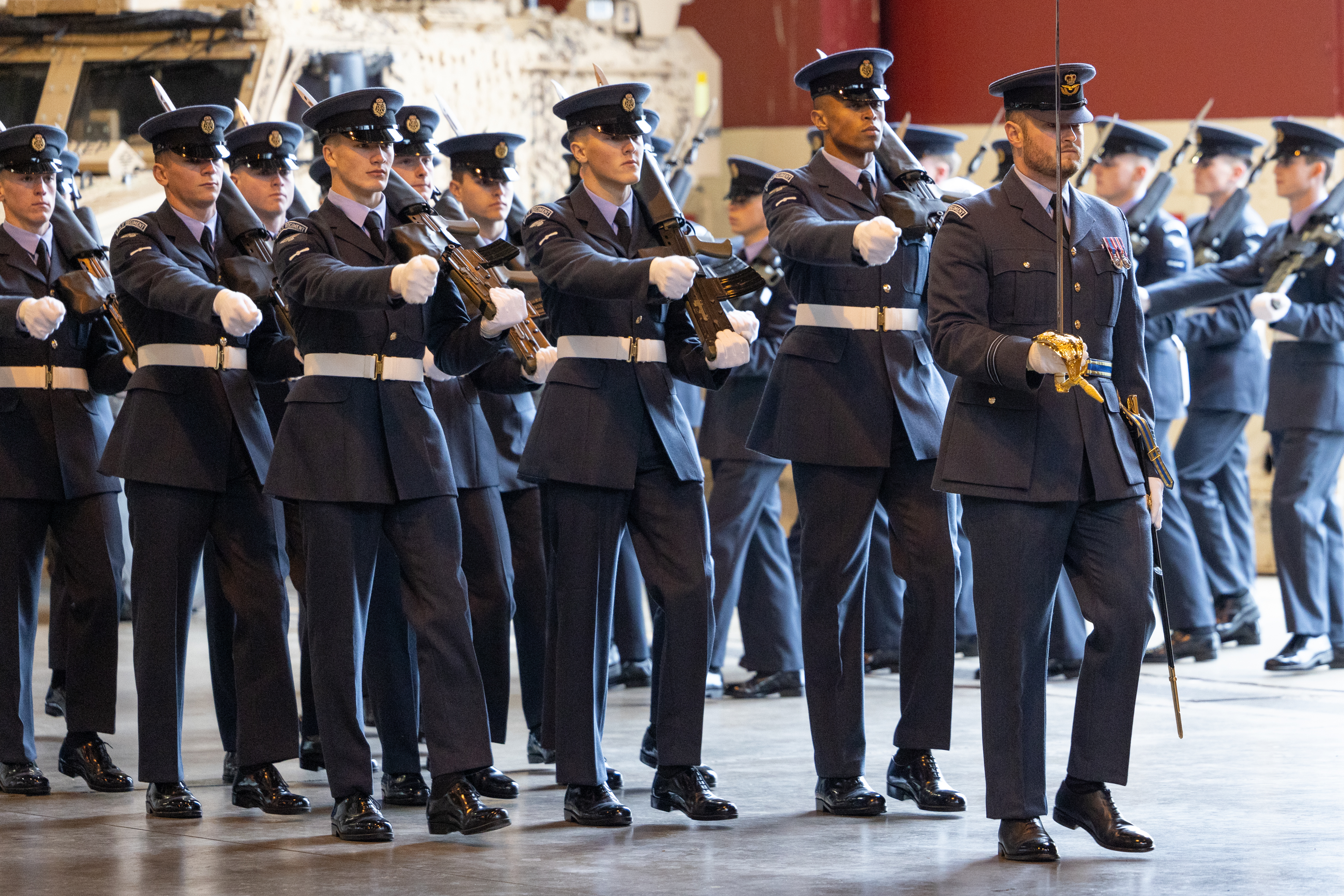 Side view of Personnel marching in line during a parade. 