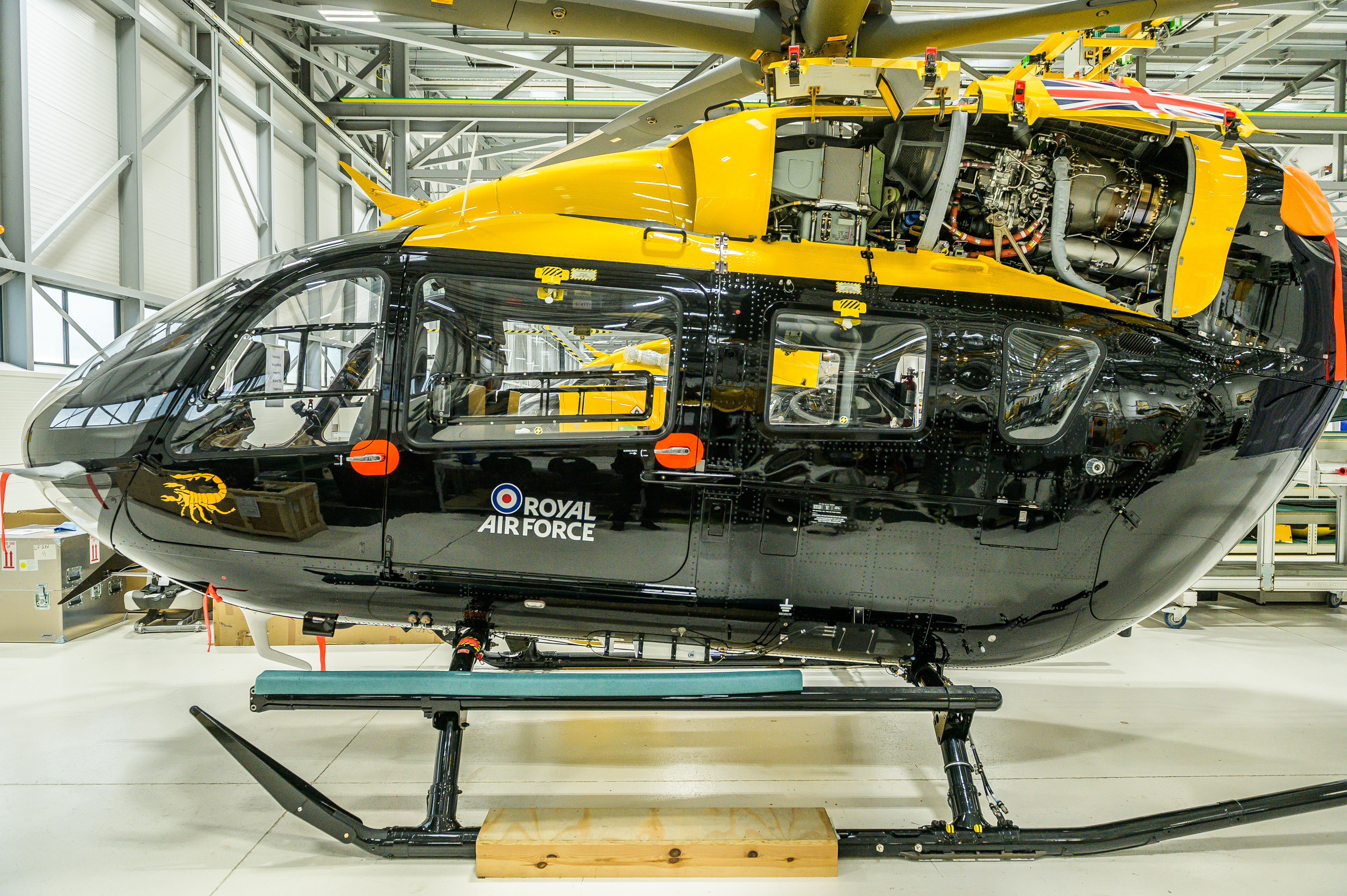 Side on view of an RAF H145 Jupiter in the Airbus workshop.