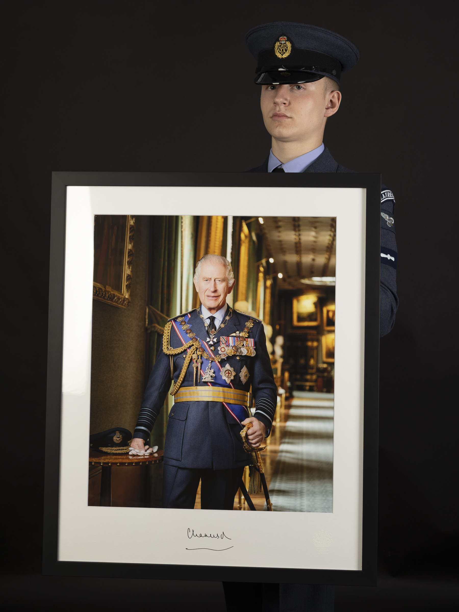 AS2 Lawrence accepting a signed portrait of HM King