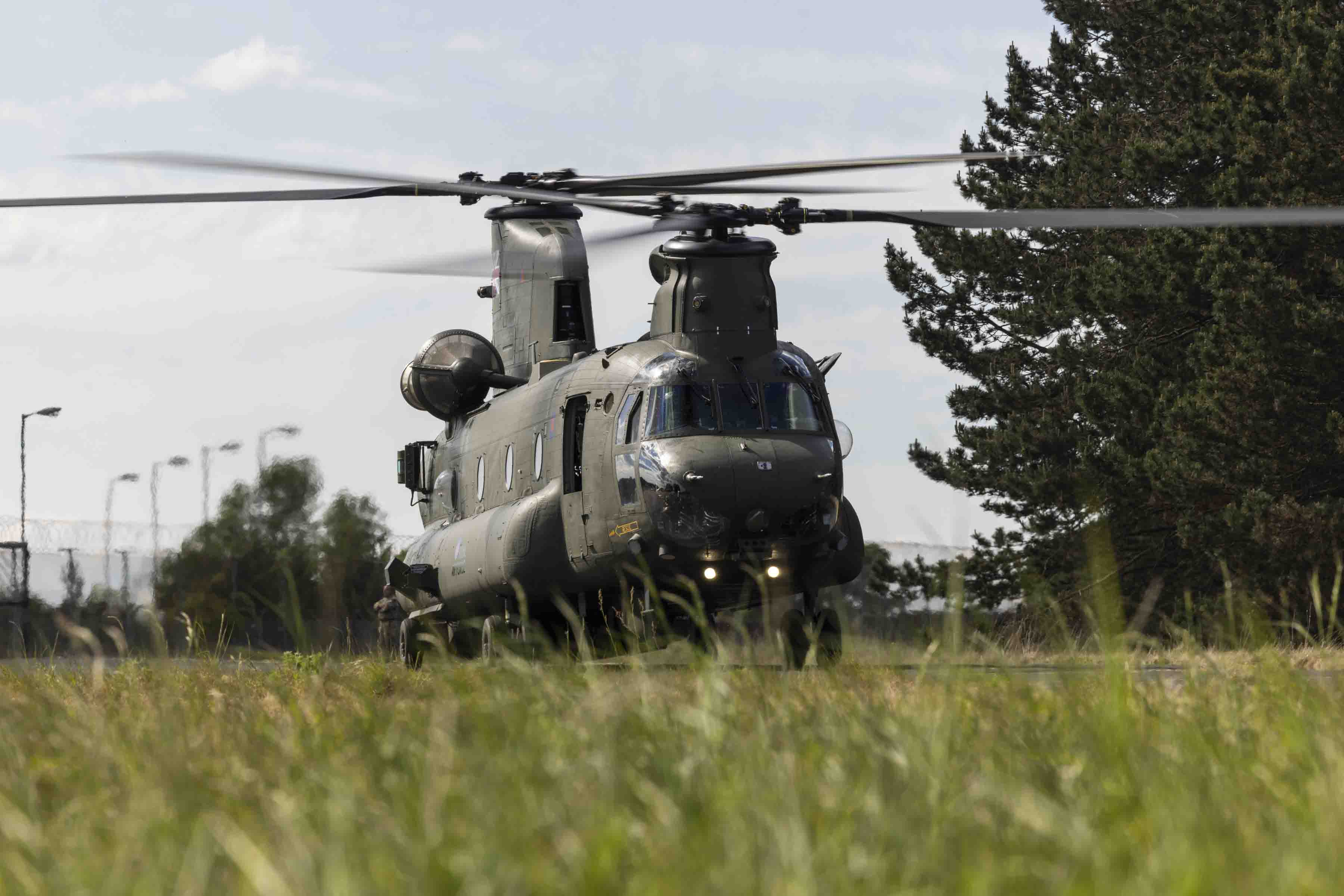 An RAF Chinook lands in an austere environment