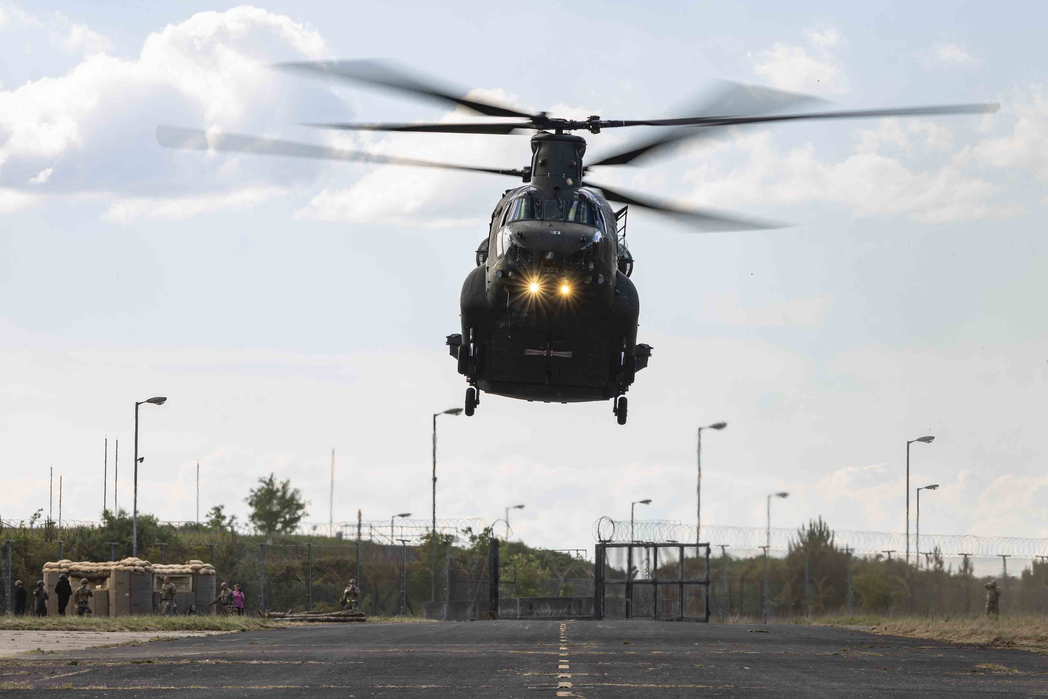 An RAF chinook takes flight from the airfield