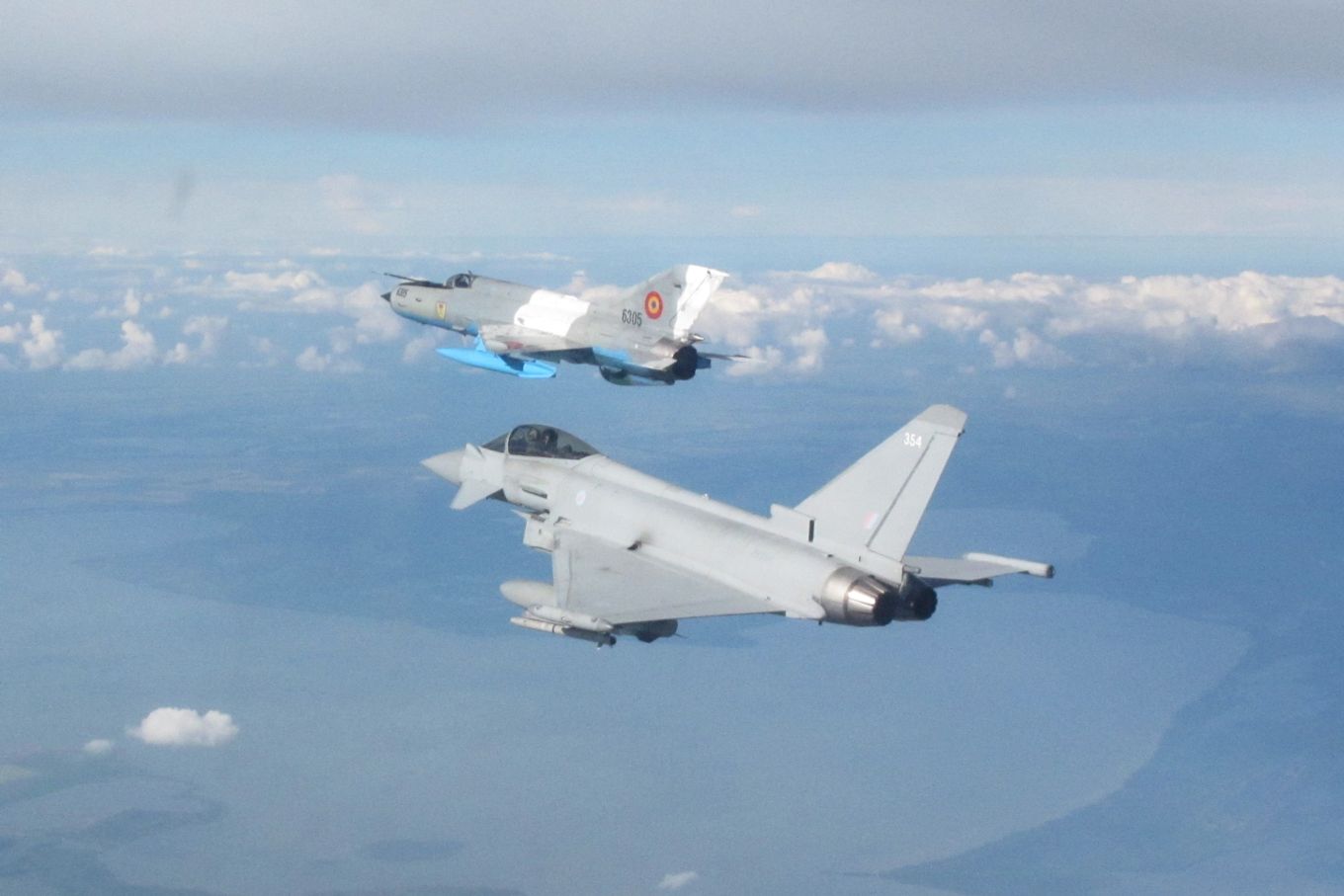 Typhoon and a Romanian MIG-21 LanceR aircraft.