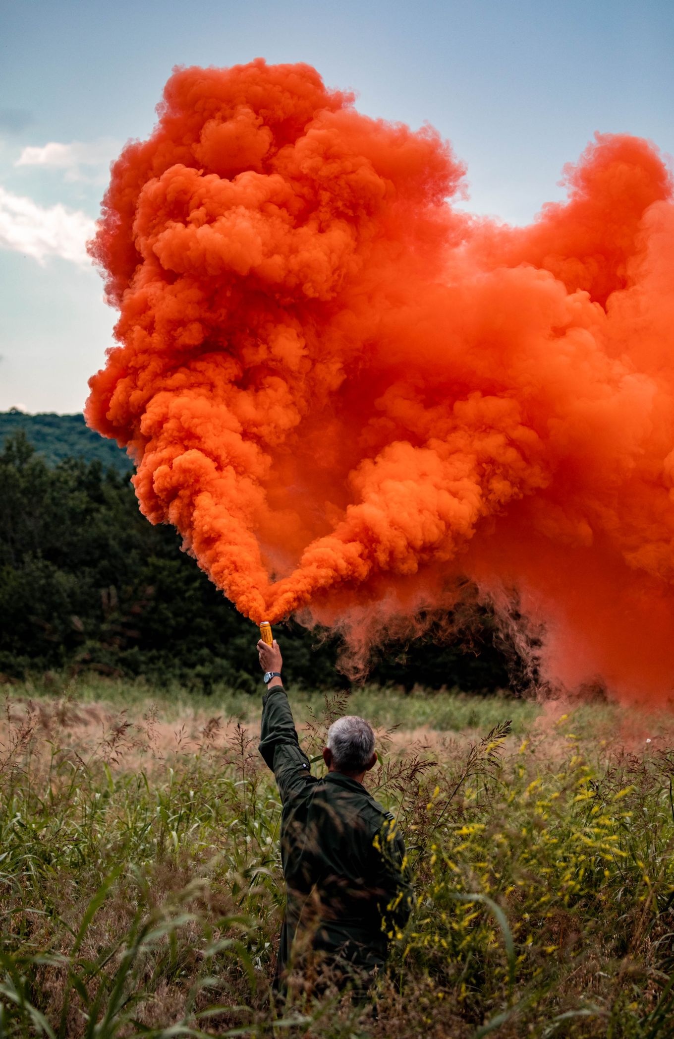 Personnel sets of red smoke flare.