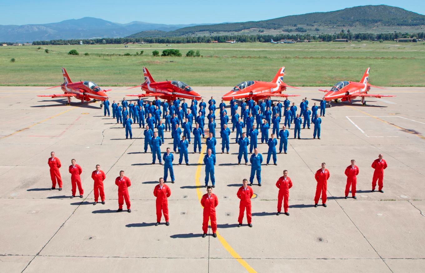 Red Arrows Team with the Blues and four aircraft in formation on the ground.