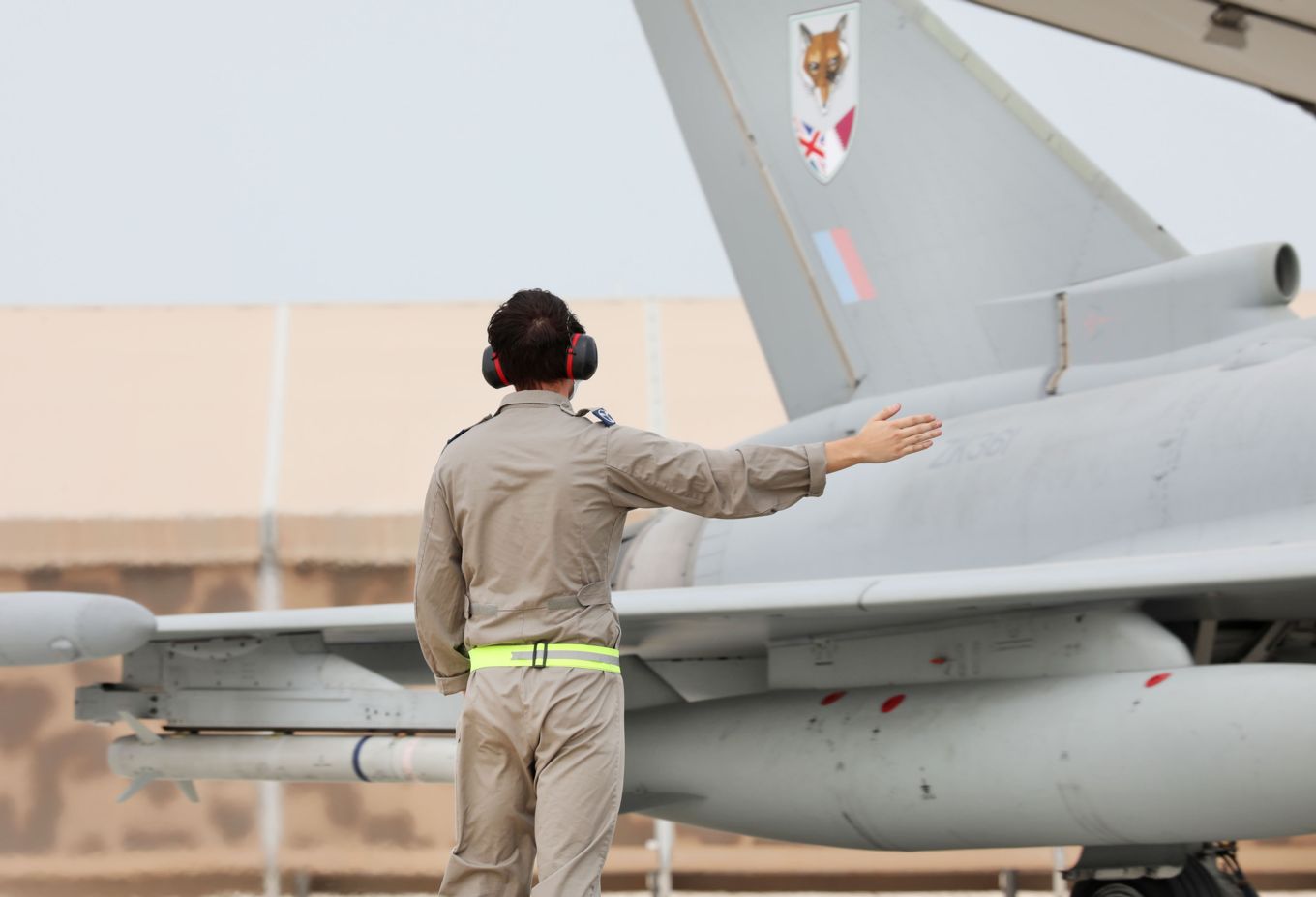 RAF Technician taxing a typhoon