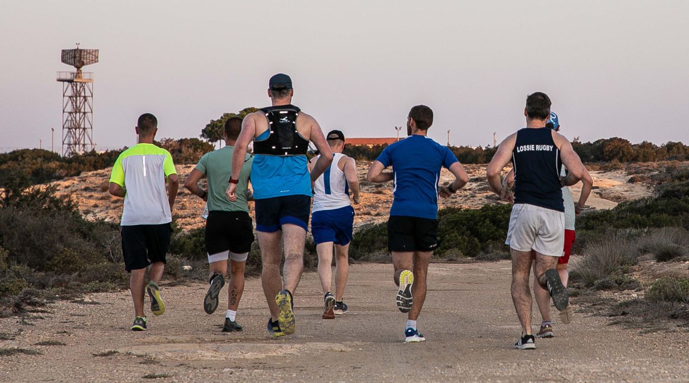The runners on the trail.