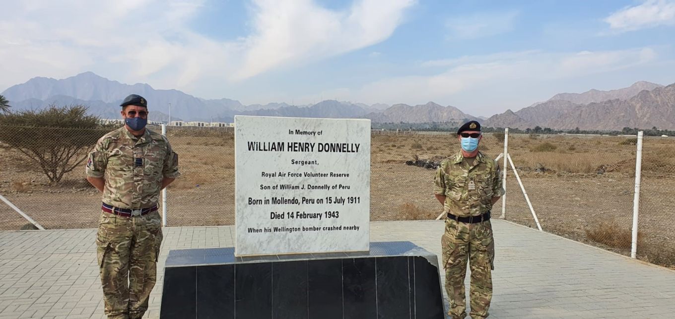 Image shows RAF personnel stood next to the memorial for Sergeant Donnelly.