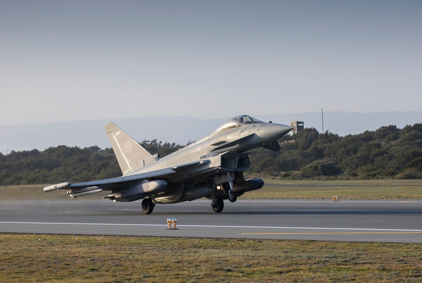 Image shows an RAF typhoon aircraft about to take off.