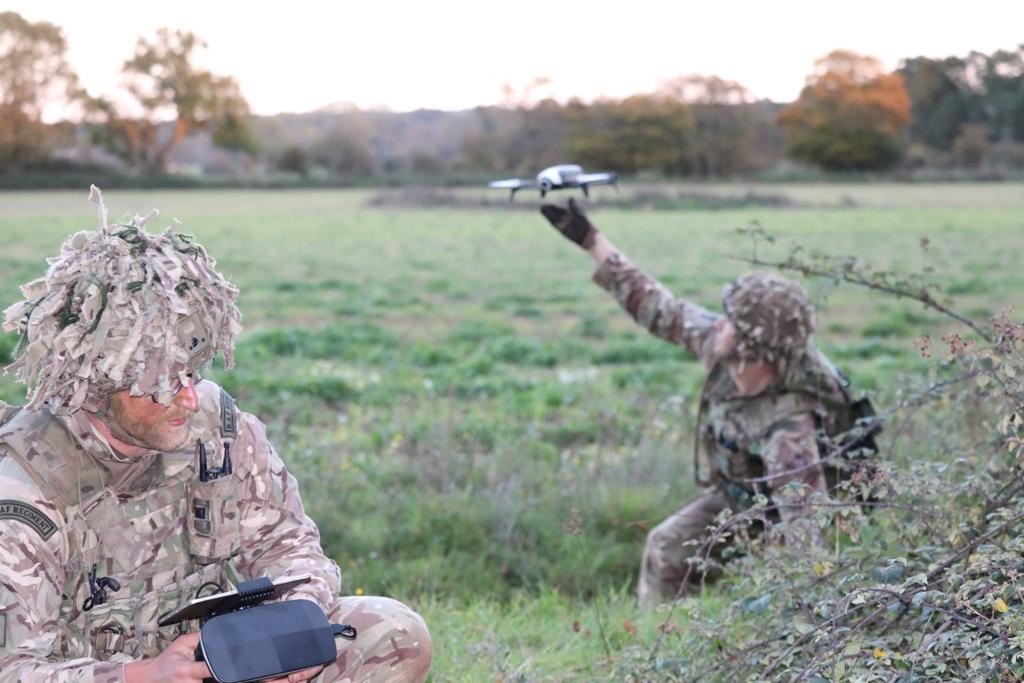 Image shows RAF Regiment personnel using a small unmanned air system.