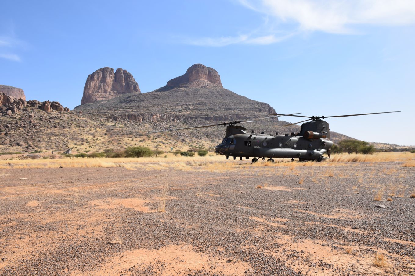 Image shows RAF Chinook on the ground in the desert.