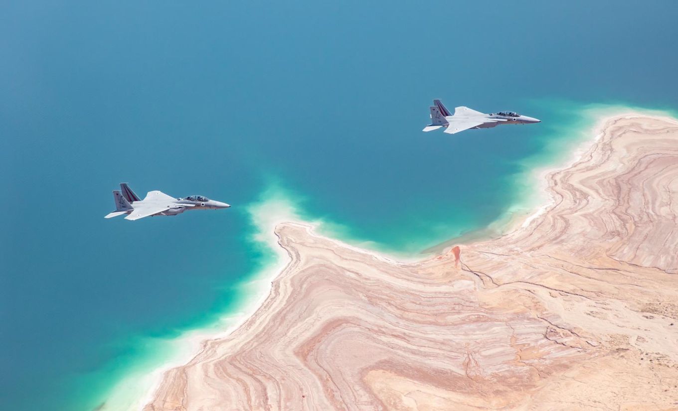 Image shows two Israeli F-15 aircraft flying.