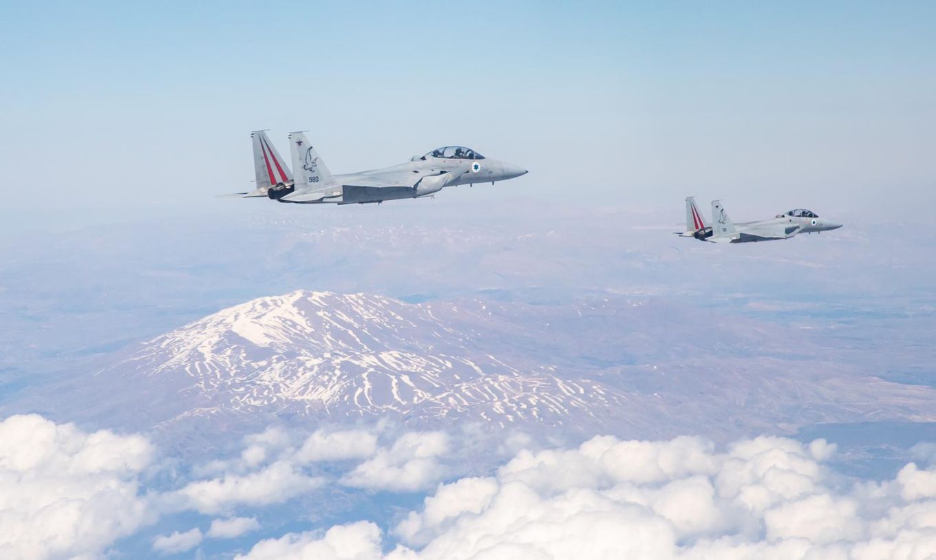 Image shows two Israeli F-15 aircraft flying.