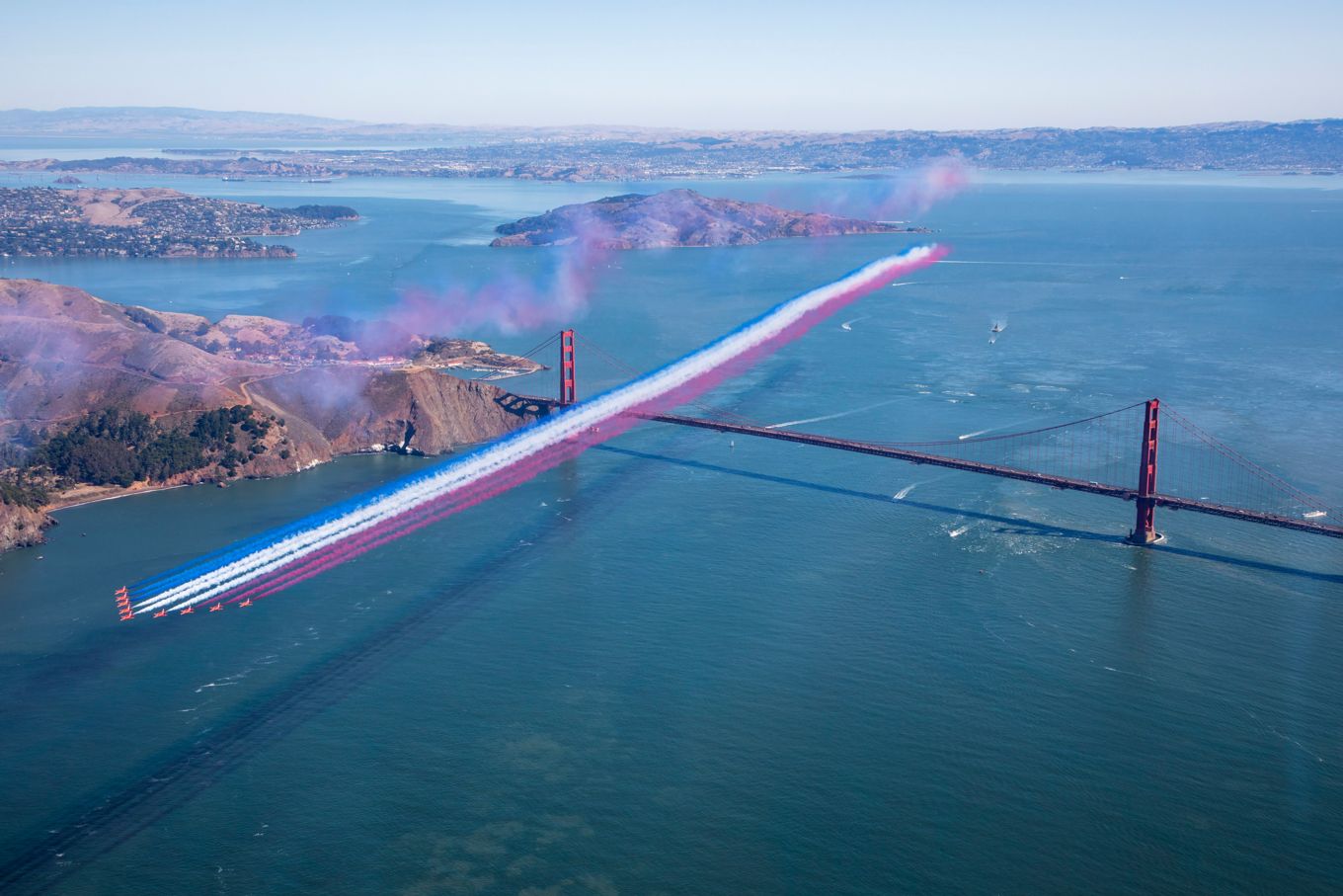 The Red Arrows over San Francisco's Golden Gate Bridge.
