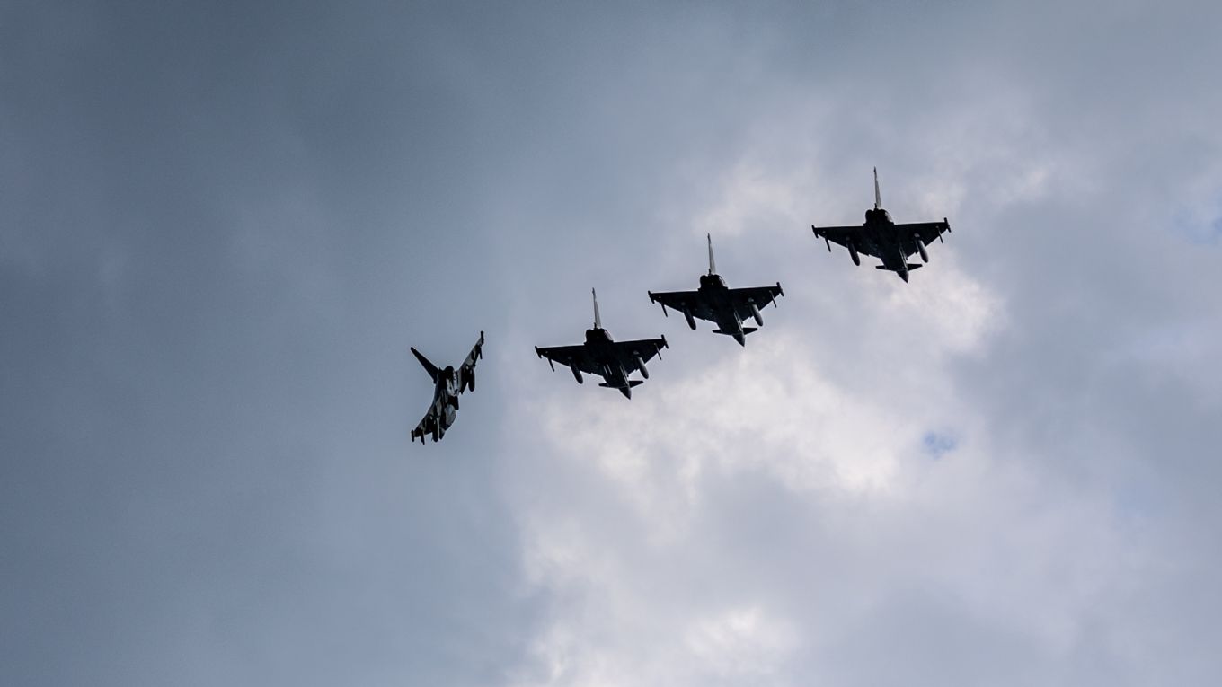 Image shows four RAF Typhoons flying.