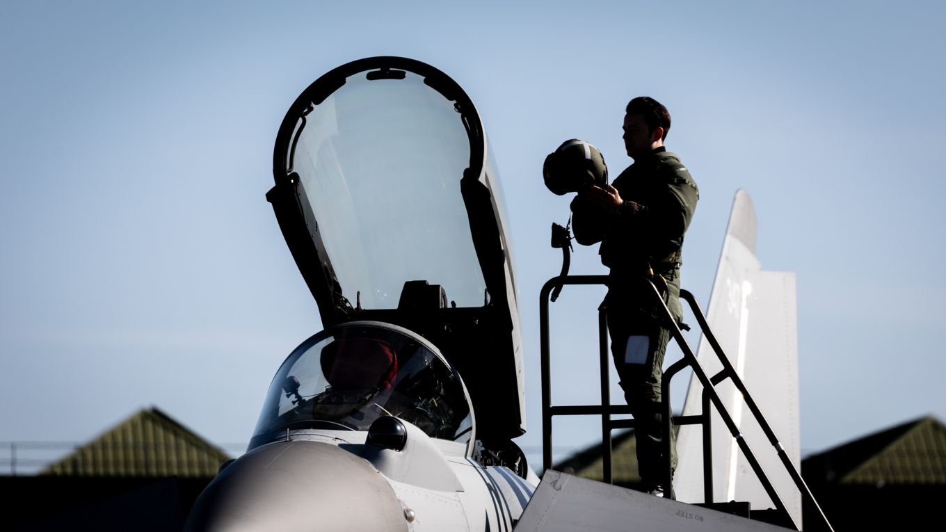 Image shows a pilot next to an RAF Typhoon after landing.