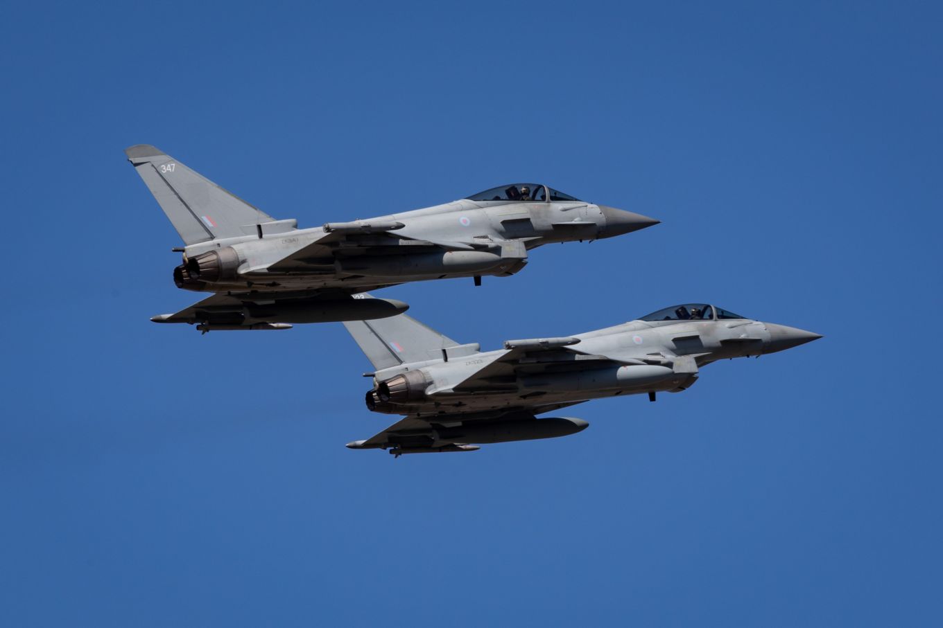 Image shows two RAF Typhoons flying.