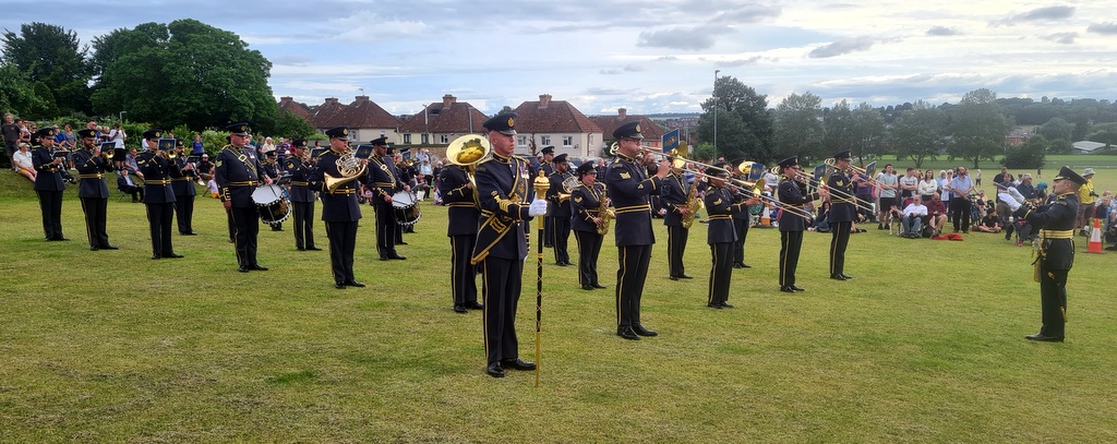 RAF Band performing with members of the public watching.